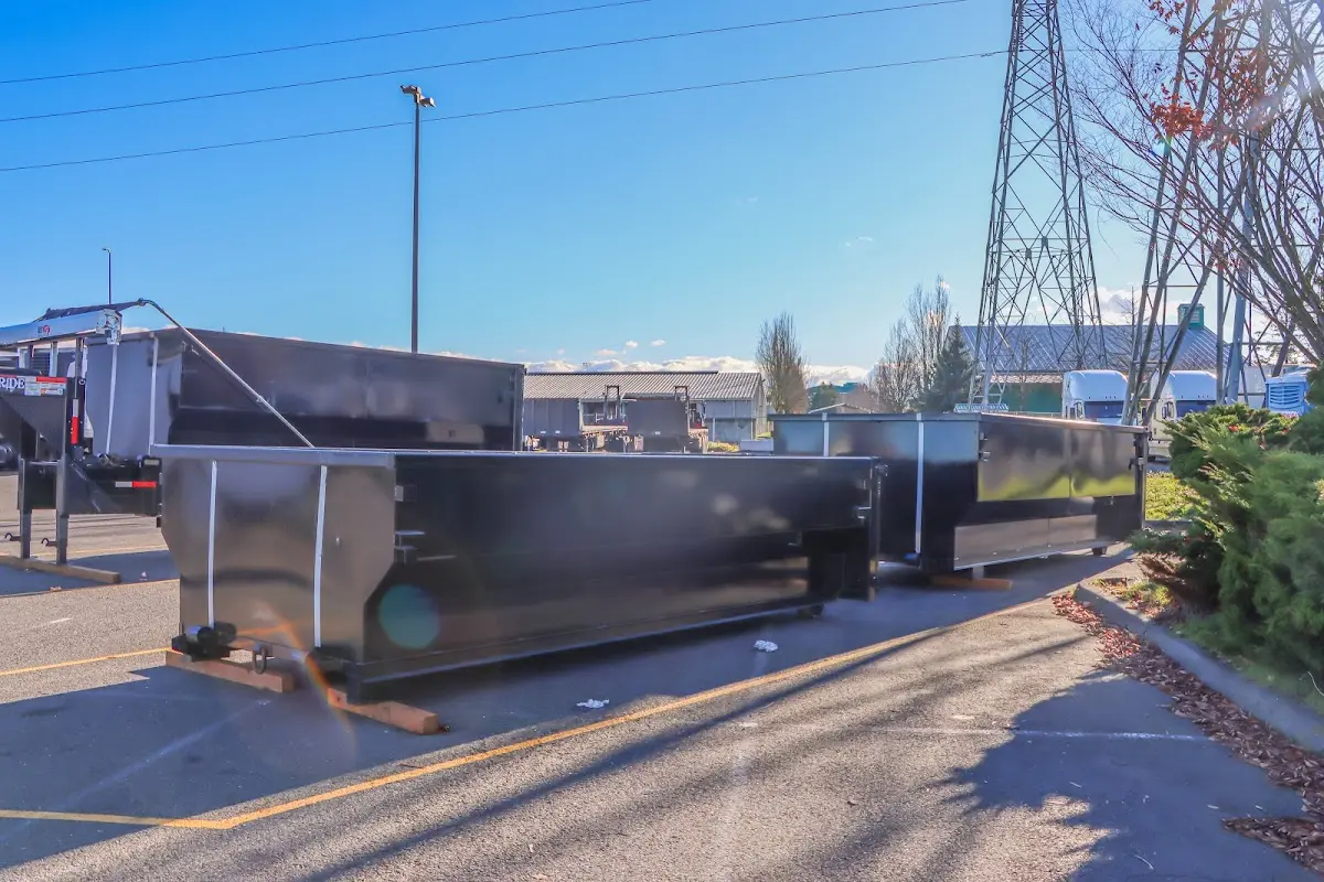 Roll-off dumpster ready for waste disposal at job site for 12 Yard Dumpster Rental in Monroeville